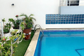 Appartement meublé 3 chambres salon avec piscine jardin au virage